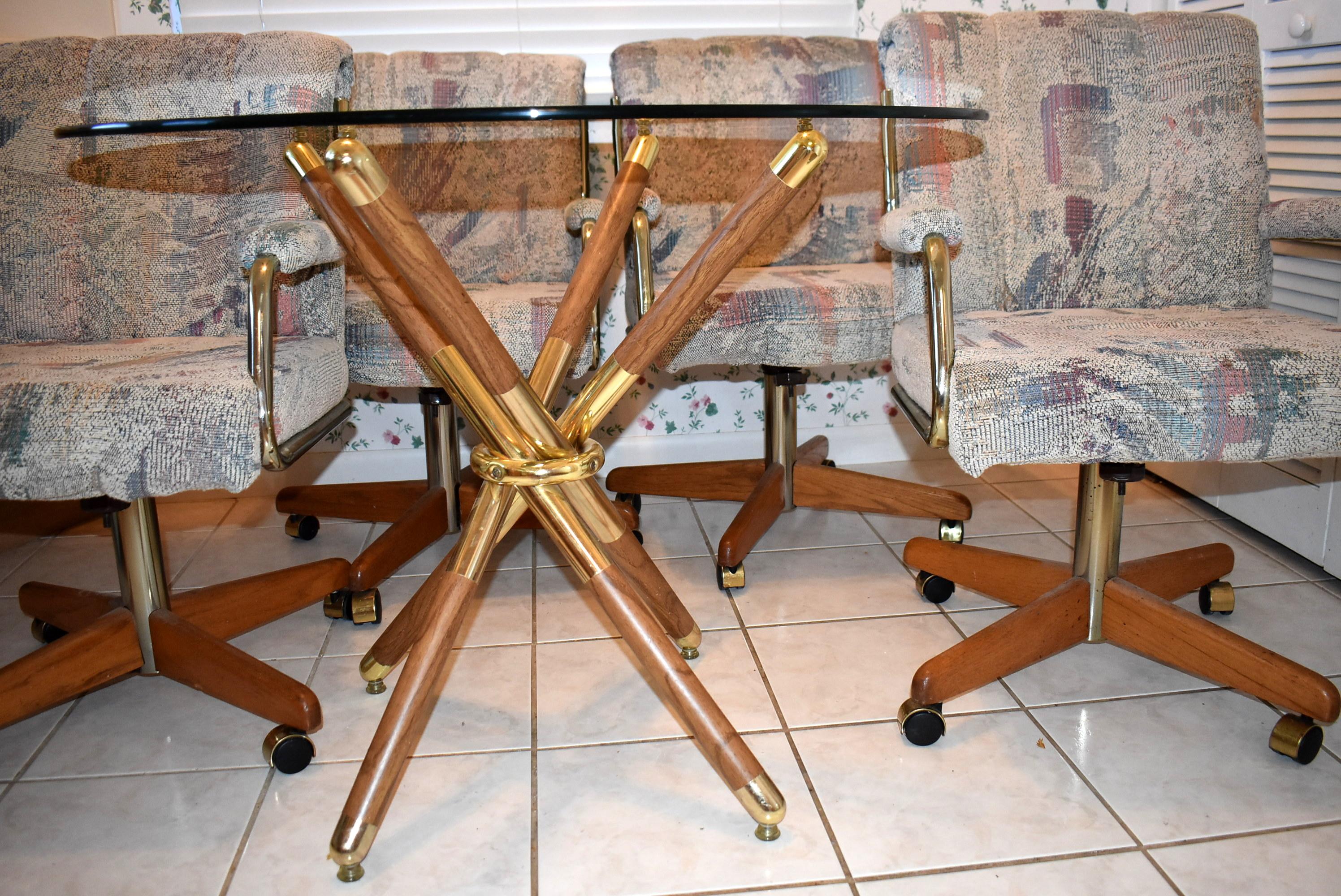 GLASS TOP DINETTE SET WITH 4 ROLLING CHAIRS