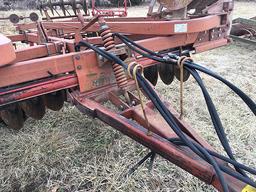 Kewanee 18ft tandem axel disk, hyd. flat fold, 9in spacings, buster bar harrow