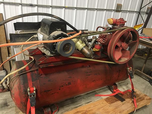 Air compressor 200 volt air compressor, runs, has hole in tank, cart not included