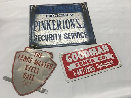 Fence Badging and Pinkertons Sign