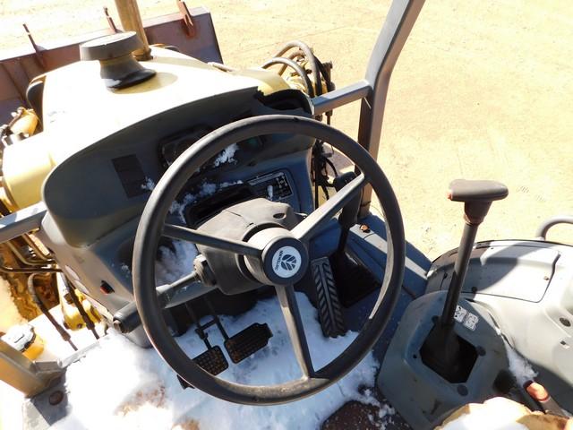 Located in YARD 1 - Midland, TX (1905) NEW HOLLAND LB75B LOADER BACKHOE S/N 0310