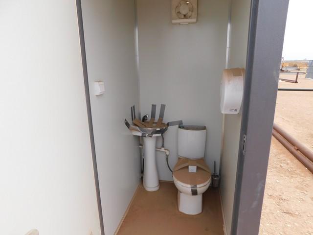 Located in YARD 1 - Midland, TX 4.6'W X 7'L X 8'T PORTABLE 2 STALL RESTROOM W/ T