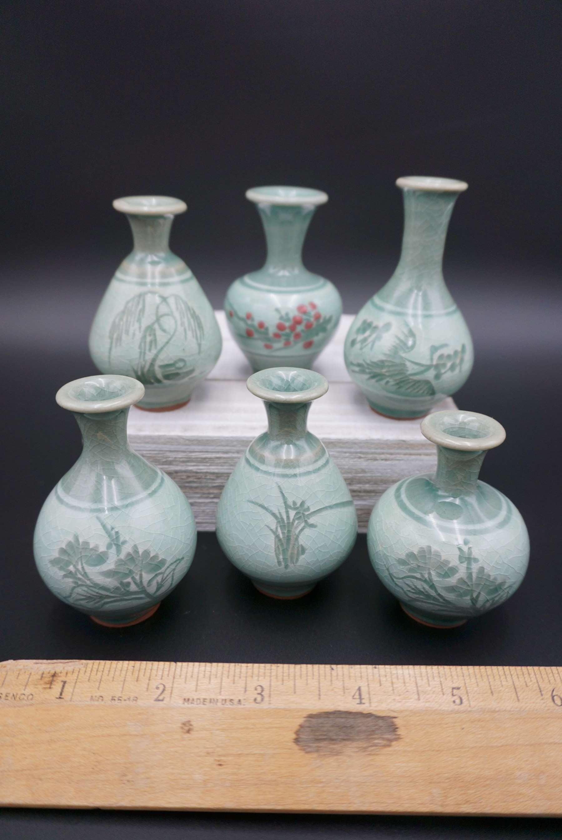 mini vases. 2 sets of 3 green celadon vases