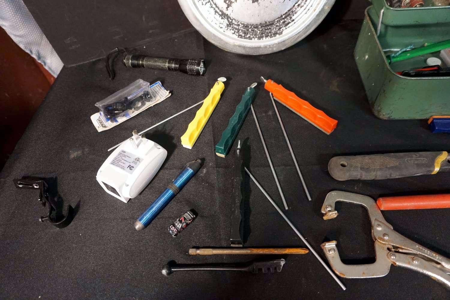 Screws. Toolbox, hubcap, tools