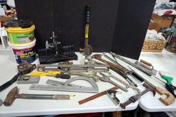 Hammers, levels, tools, saws, and more.