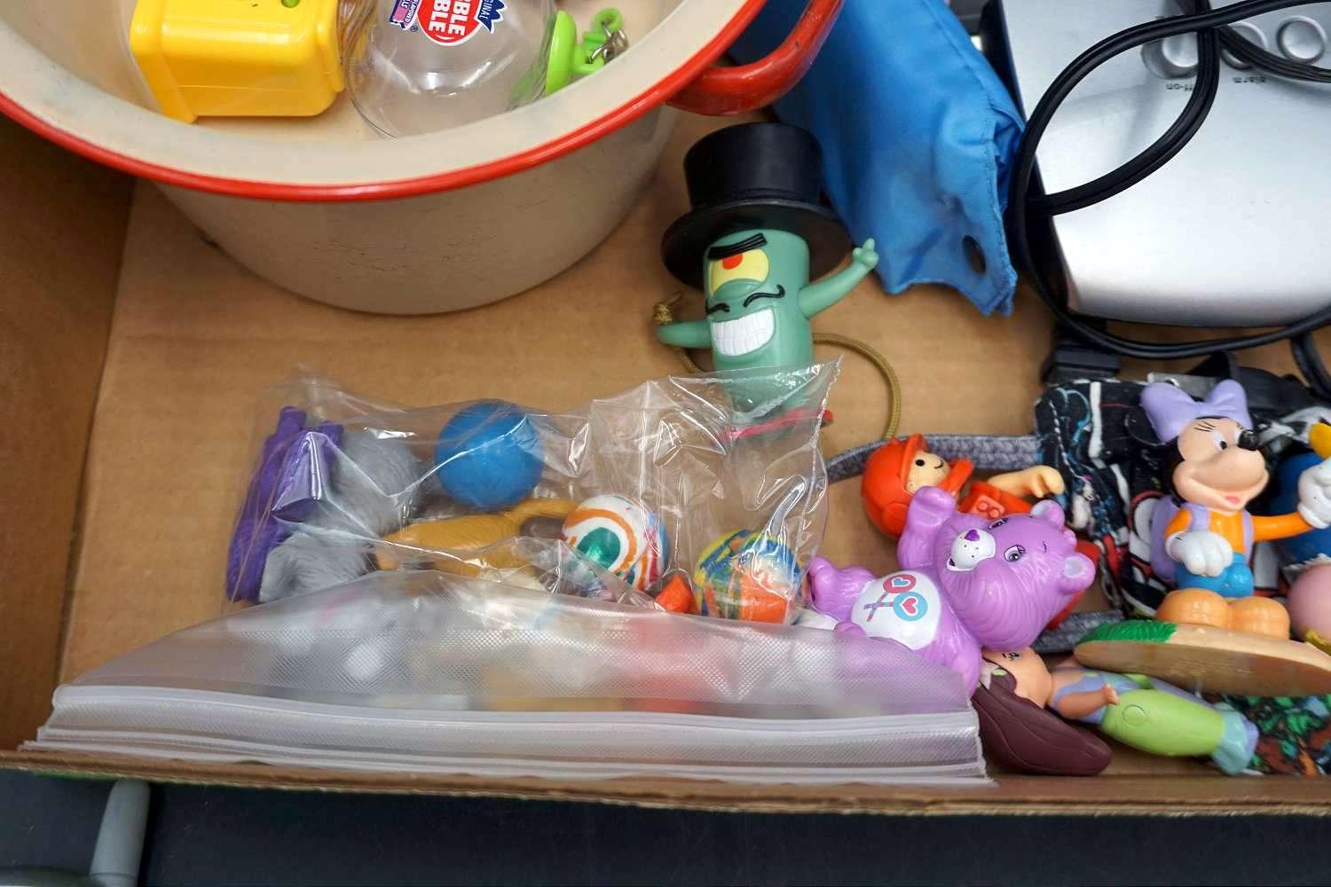 Toys, cell phone, enamel pot, electronics.