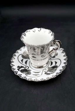 Norcrest silver trimmed cups and saucers.