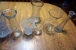 Assorted glass vases and milk Bottle.
