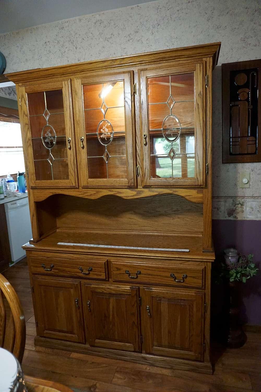 lighted Hutch with lead glass doors. Two pieces. Could be a buffet.