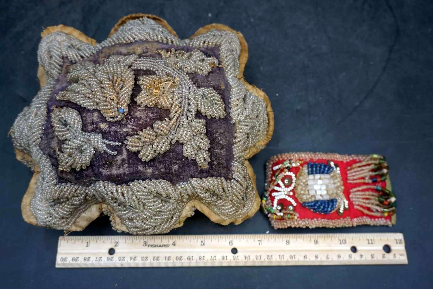 Ornate beadwork, Native American? The pillow item on the left is torn and leaking what looks like sa