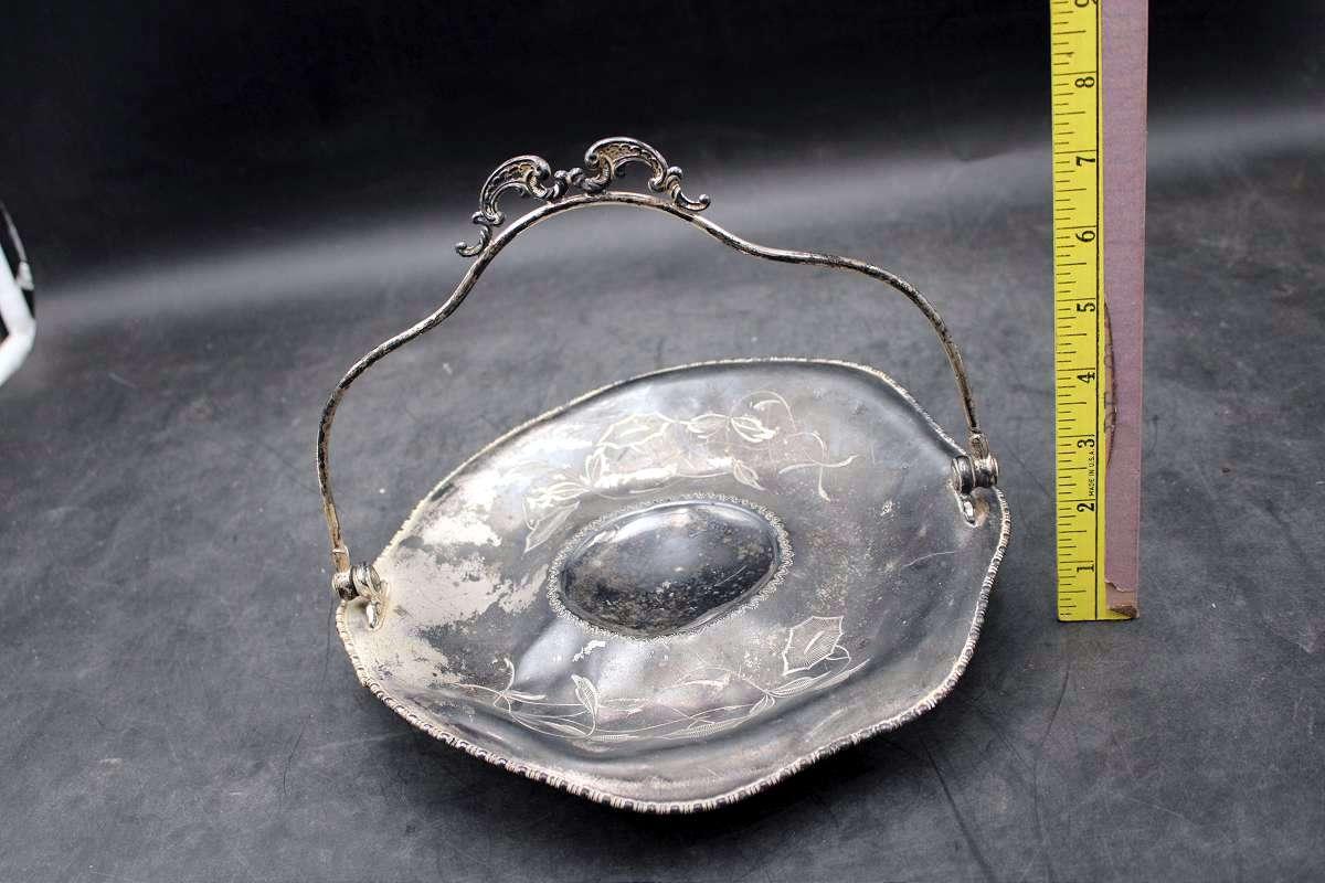 Silver service tray with handle.