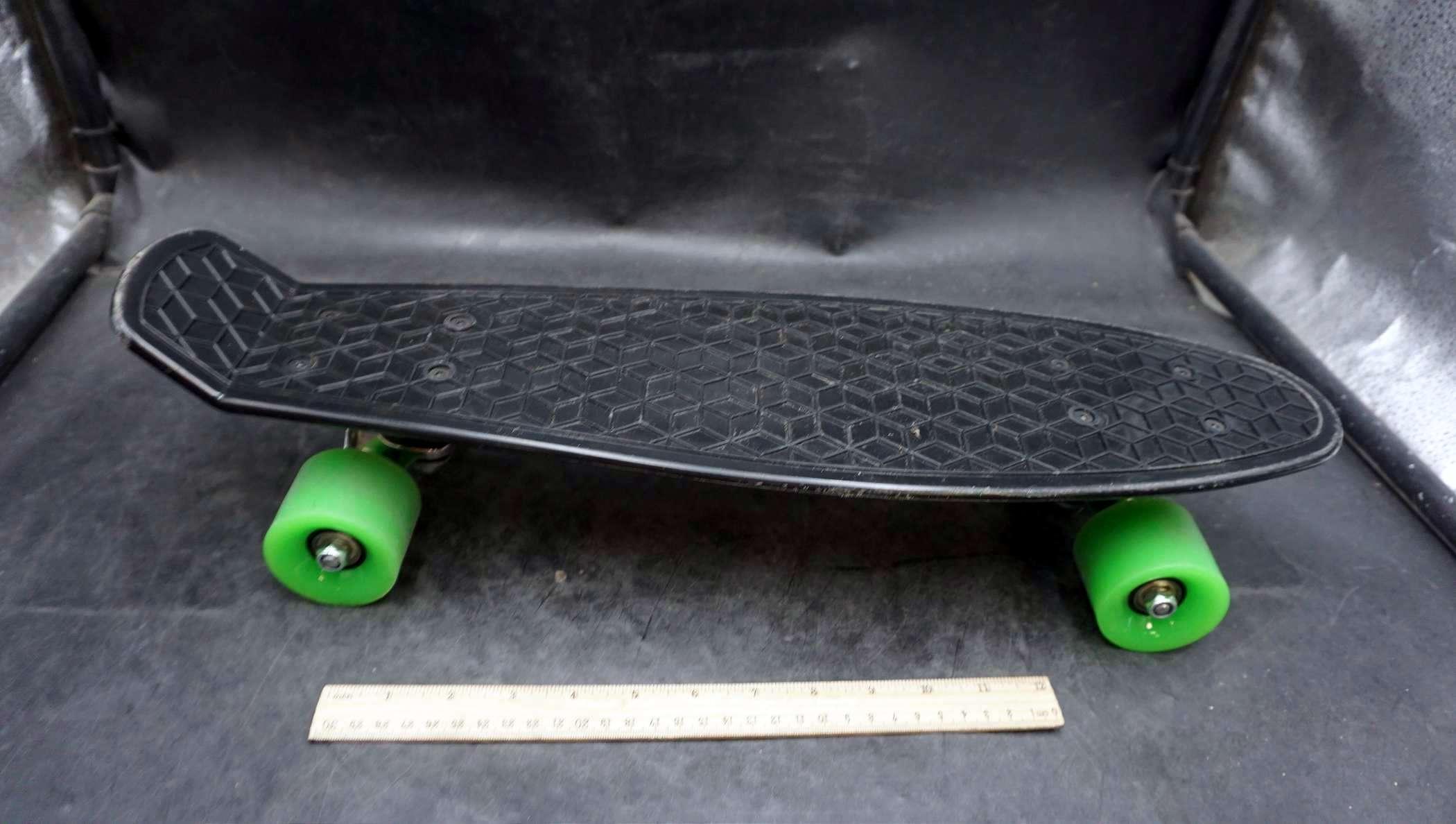 Black Skateboard W/ Green Wheels