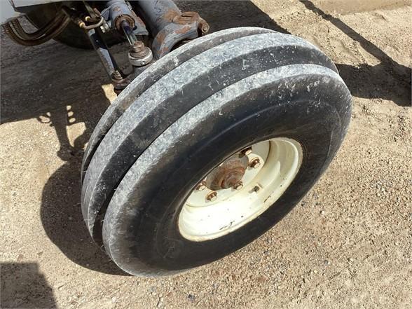 1999 Ford 8160 Tractor W/ NH 7312 Loader