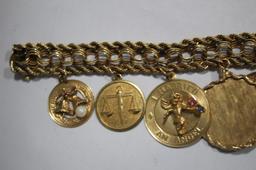 14K Gold Bracelet with 9 14K Charms 63.02g
