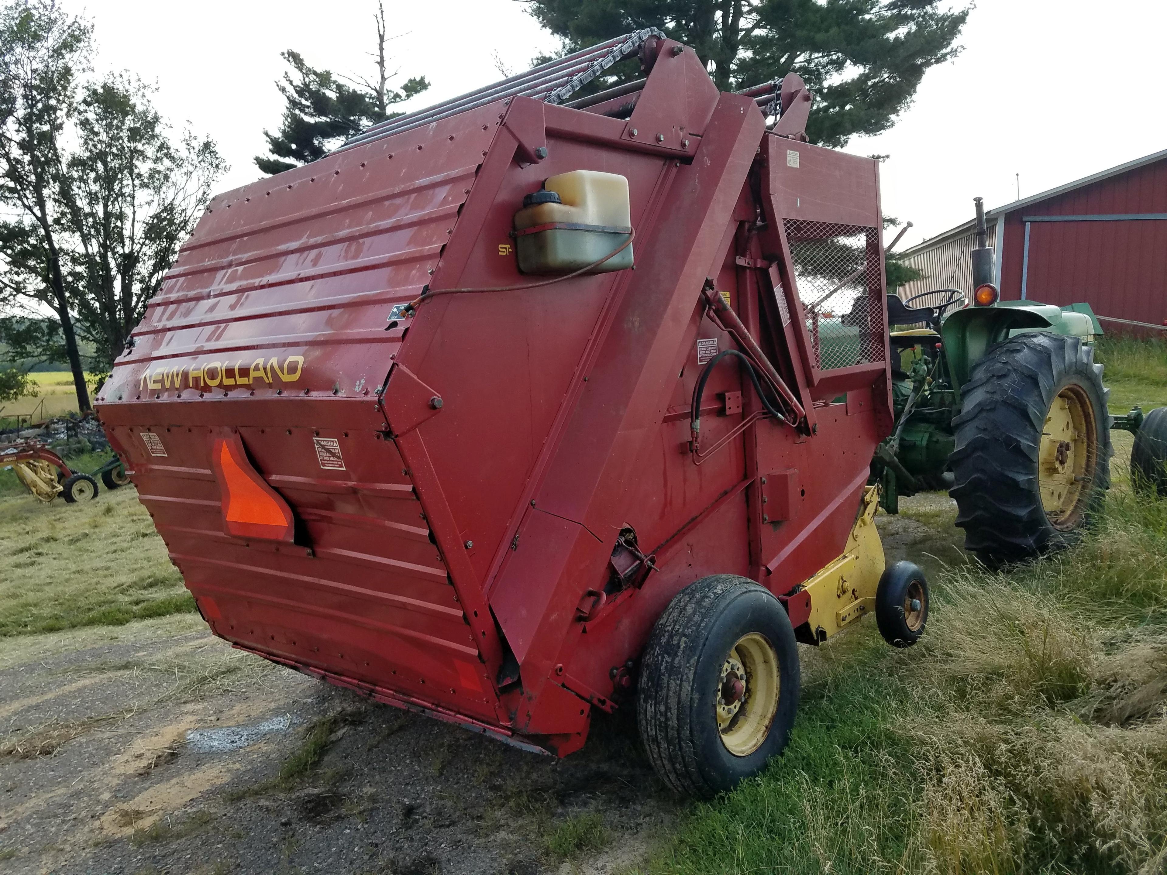 New Holland 854 round baler. S/N: 590572. Bought new. Manual twine tie. Cha