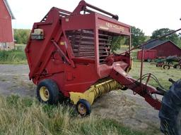 New Holland 854 round baler. S/N: 590572. Bought new. Manual twine tie. Cha