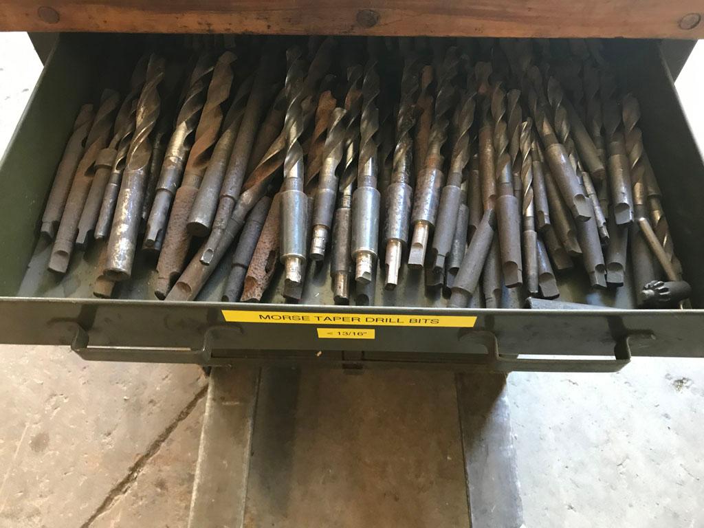 Drawer file of assorted 1/4"-3" Morse taper drills and reamers