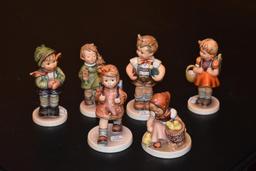 Grouping of six Hummel figurines including HUM 467 the kindergartners #4O9 With box and five others.