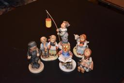 Grouping of six Hummel figurines including 159 parade of lights with box, HUM418