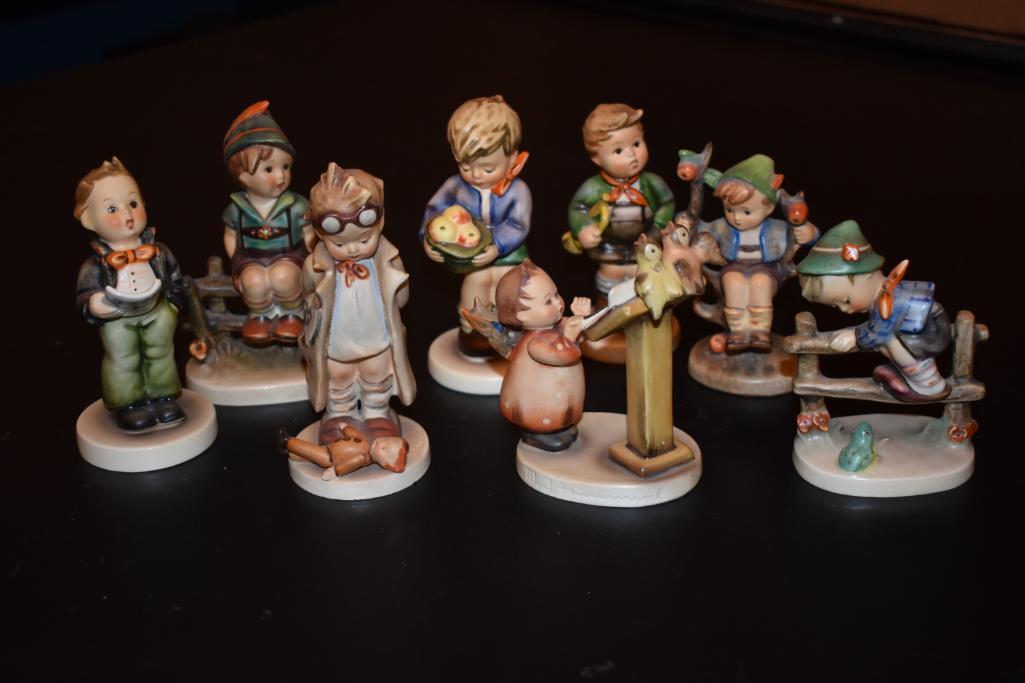 Eight Hummel figurines