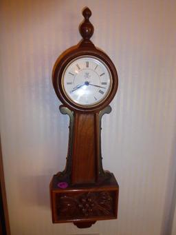 MAKER: Ray Kinzie - Case: Walnut w/bottom carved panel - Model: Banjo - Movement: Quartz Timepiece -