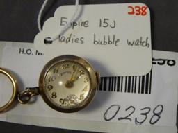 Empire 15 Jewels ladies bubble watch, runs,...Runs but pendant doesn't engage to set time.