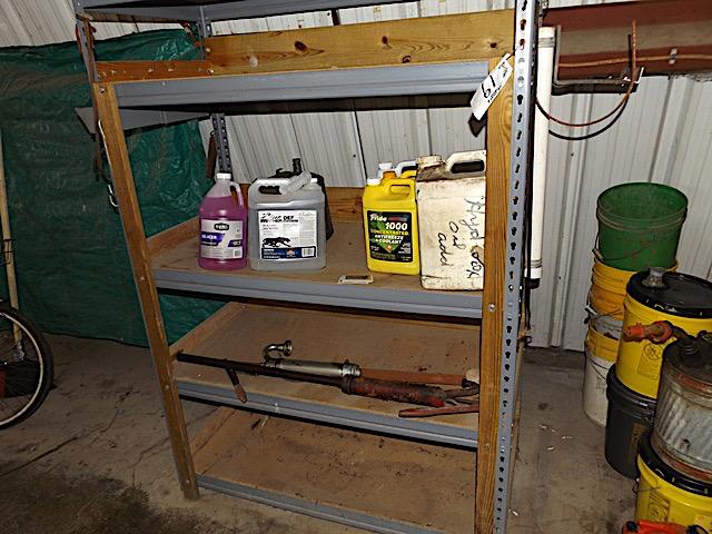 4 shelf metal rack, barrel pump, misc oils, 2 gal def