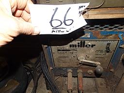 Miller 180 stick welder with small bolt bin
