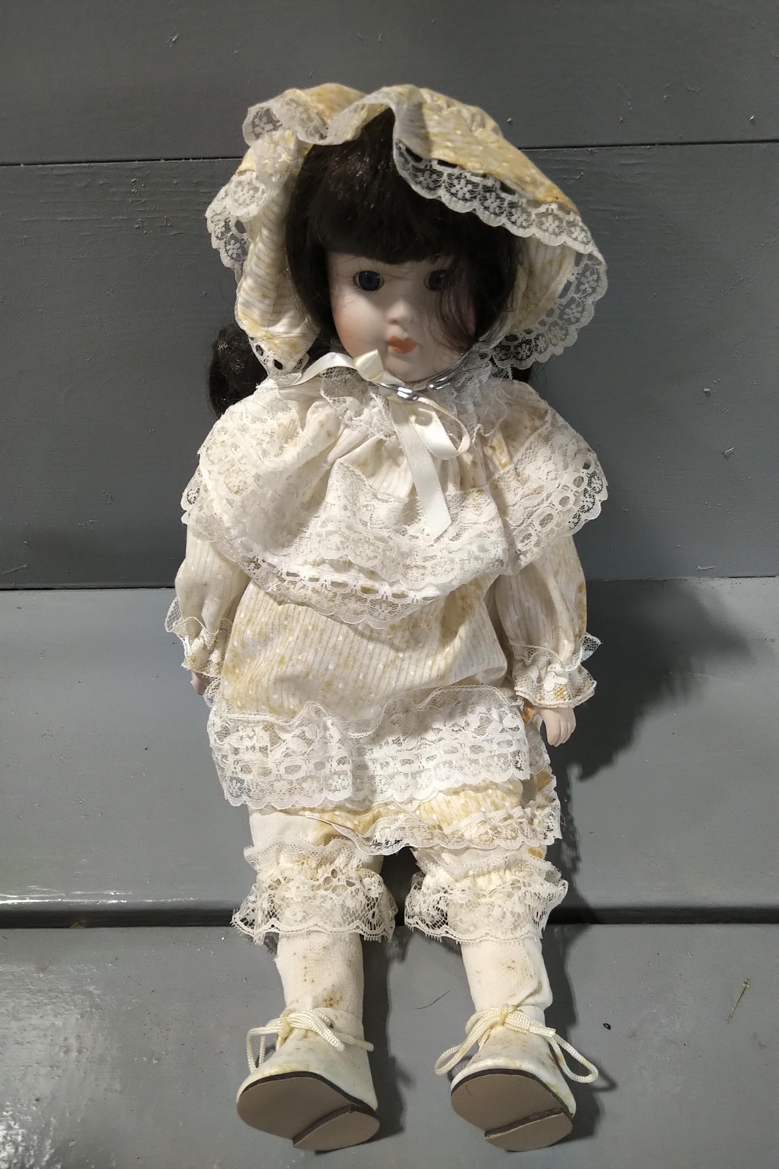 7 PORCELAIN DOLLS