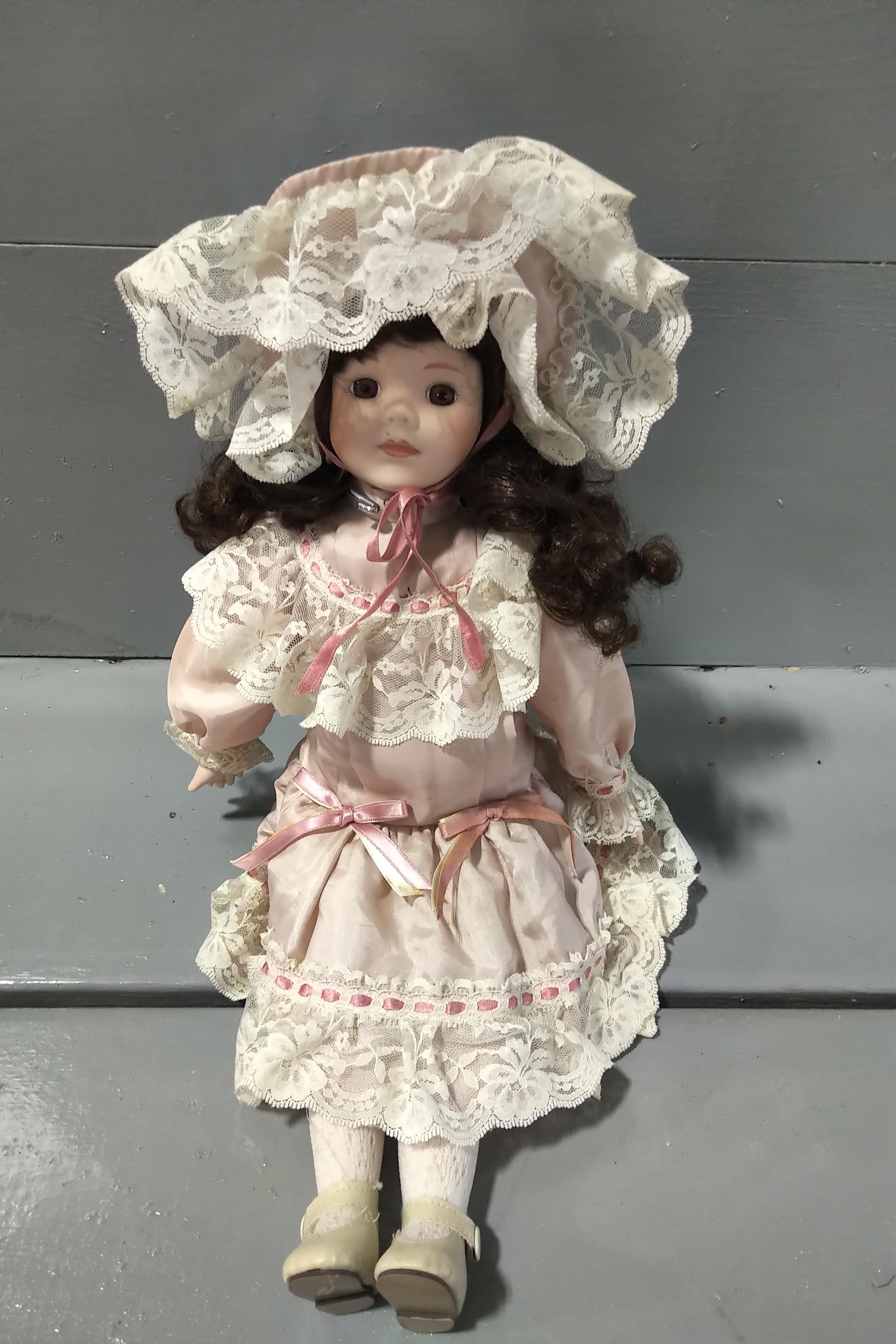 7 PORCELAIN DOLLS