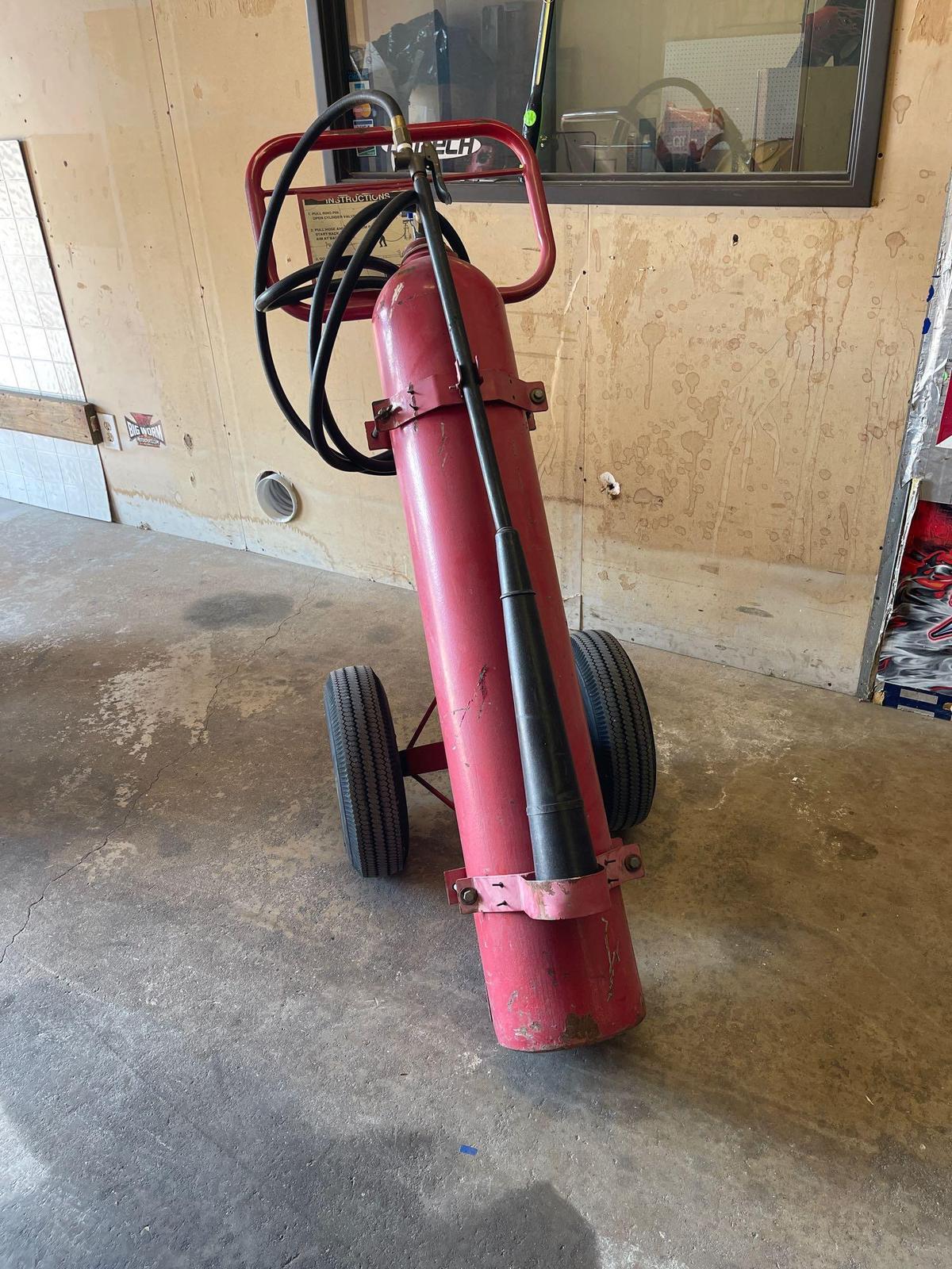 CO2 Extinguisher, Single 50 pound bottle on cart