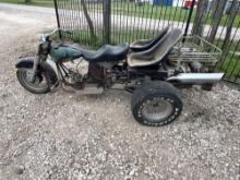 Trike motorcycle. it has a Corvair engine, Harley Davidson fuel tanks. Does not run wouldn?t take
