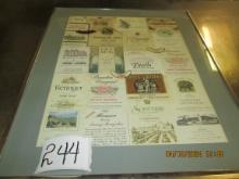 aluminum framed assorted wine label wall hanging