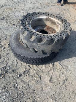 Assortment of Skid Steer and Truck Tires and Wheels