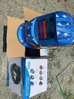 2 New auto darkening welding helmets UNUSED