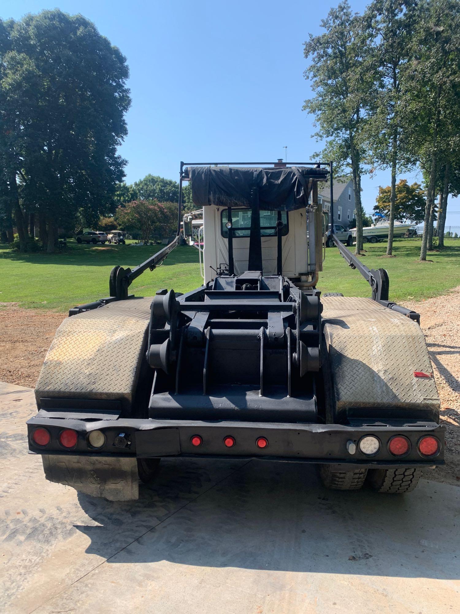 2005 Mack Granite CV713 Tri/A Rolloff Truck