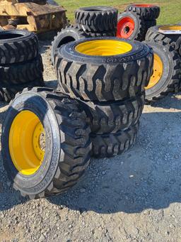 set of 4 new 12-16.5 Forerunner Skid Steer tires on NH/JD/CAT rims