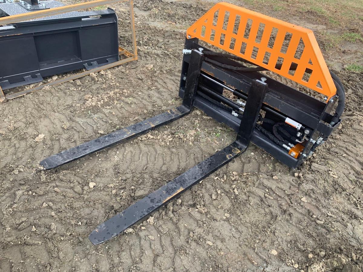 UNUSED WOLVERINE HYDRAULIC SKID STEER FORK ATTACHMENT