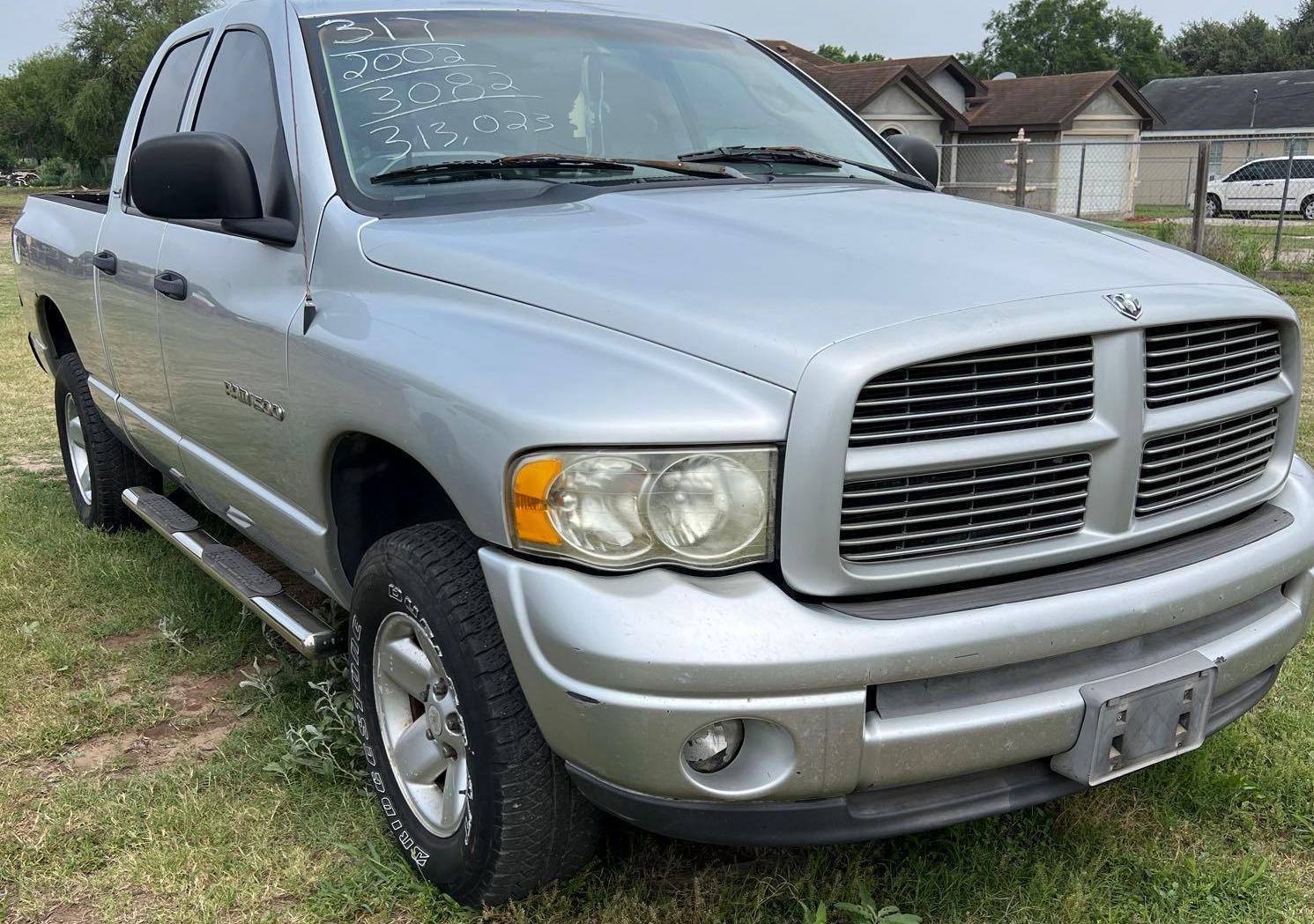 2002 Dodge Ram, VIN # 1B7HU18N72J113082