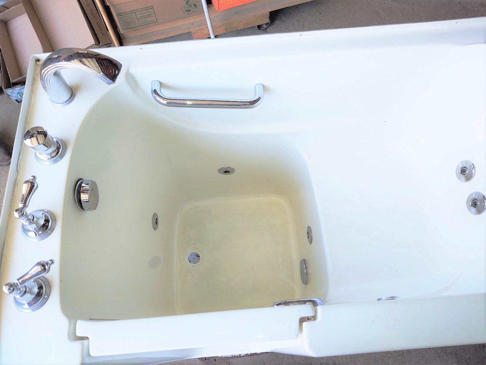 SMALL WHIRLPOOL WALK IN TUB WITH JETS - NEEDS DRAIN - PICK UP ONLY