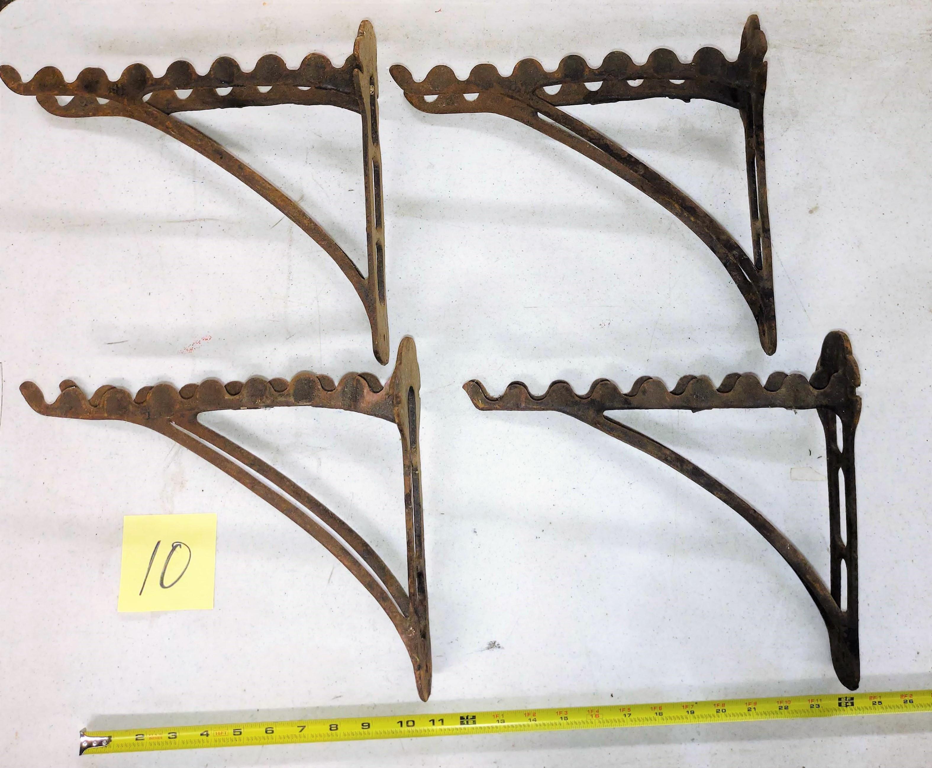 ANTIQUE CAST IRON WALL MOUNT HARNESS RACKS