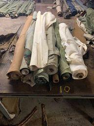 9 rolls of cotton fabric ( camo, brown and tan)