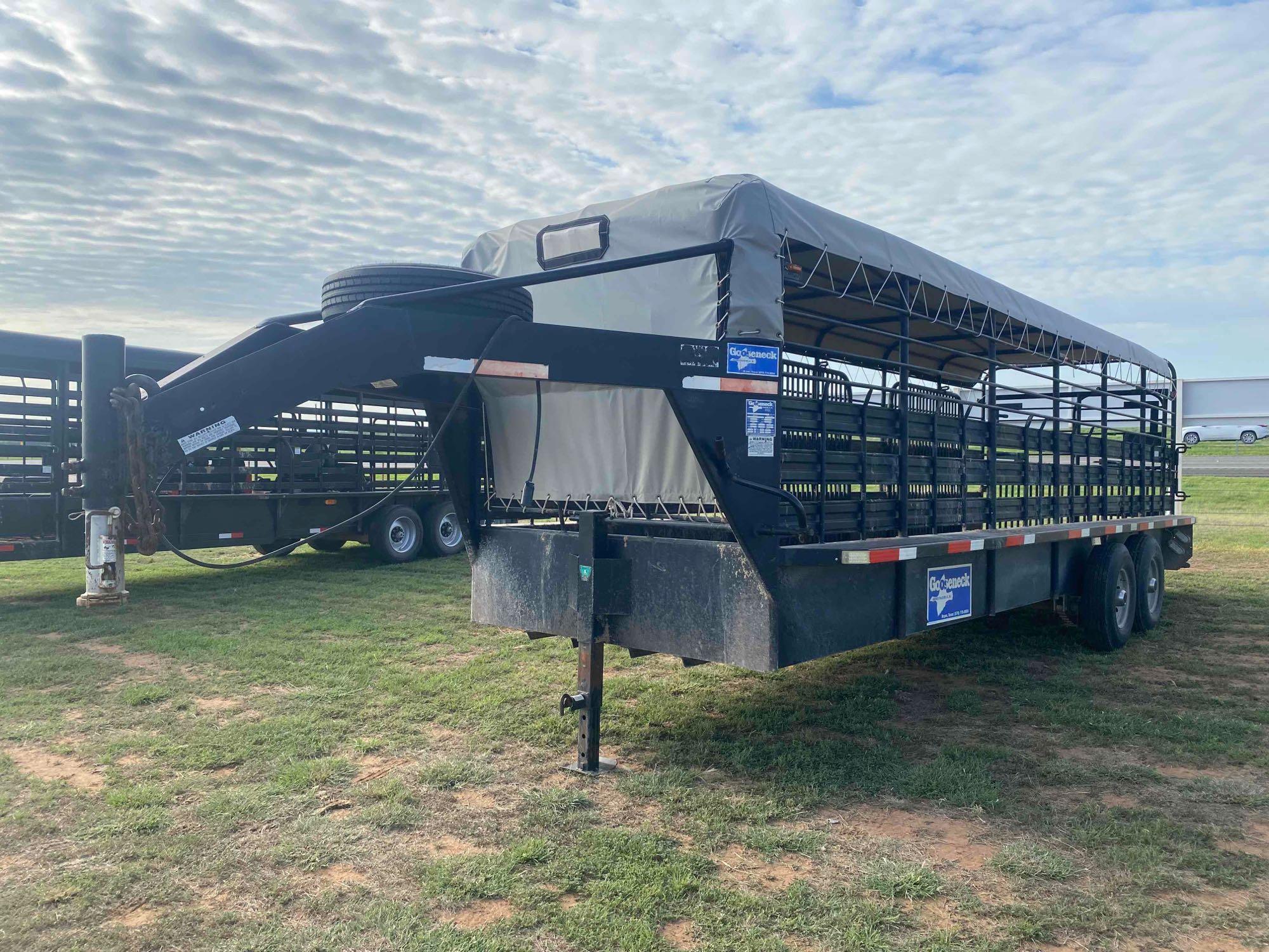 2021 24' x 6' Gooseneck Cattle Trailer, has 2... 8' Cuts, tandem axle, tires in good shape, tarp is 