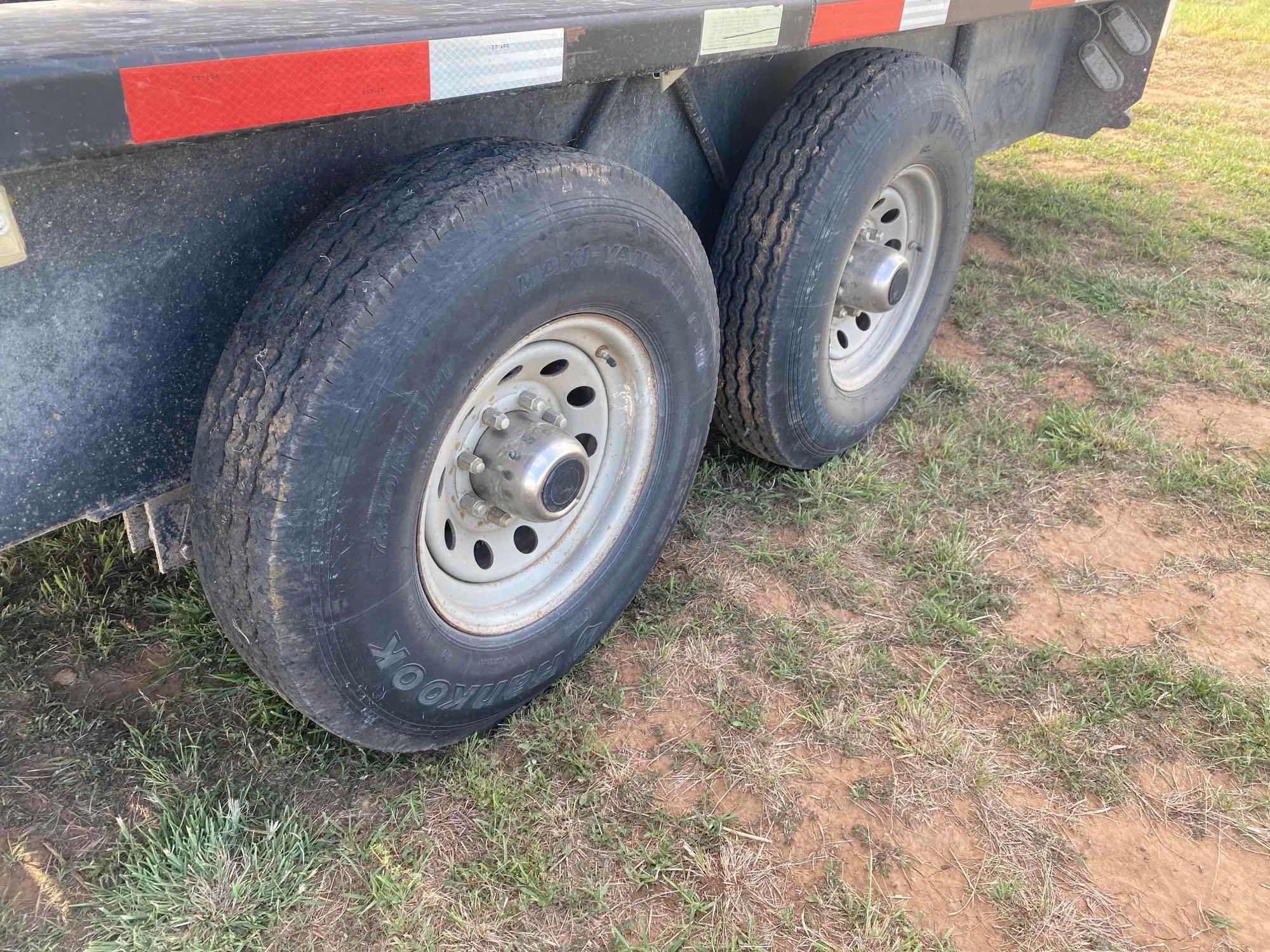 2021 24' x 6' Gooseneck Cattle Trailer, has 2... 8' Cuts, tandem axle, tires in good shape, tarp is 