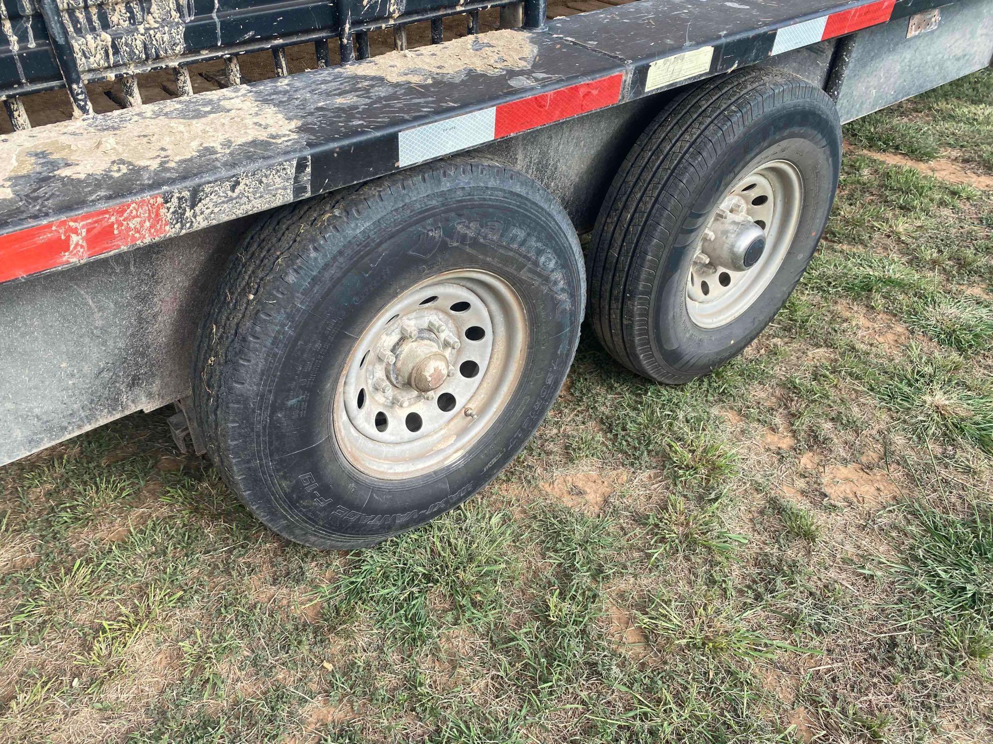 2021 24' x 6' Gooseneck Cattle Trailer, has 2... 8' Cuts, tandem axle, tires in good shape, tarp is 