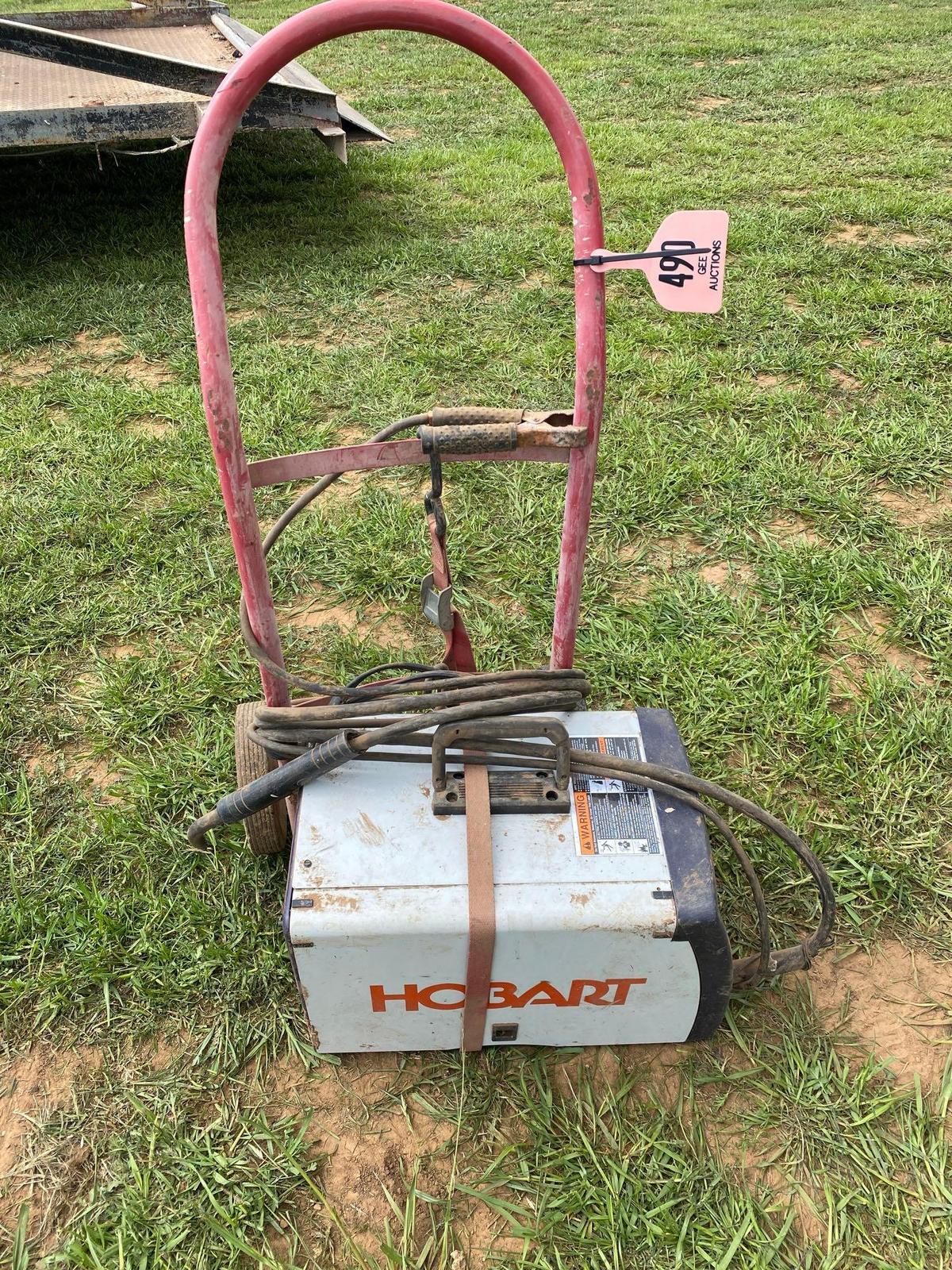 HOBART WIRE WELDER... ON DOLLY HOBART HANDLER 135 RUNS AND OPERATES