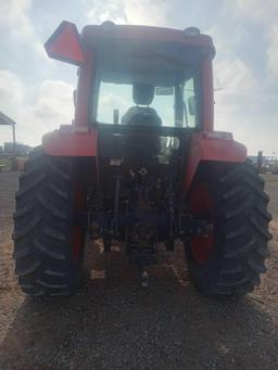 KIOTI TRACTOR WITH FRONT LOADER BUCKET