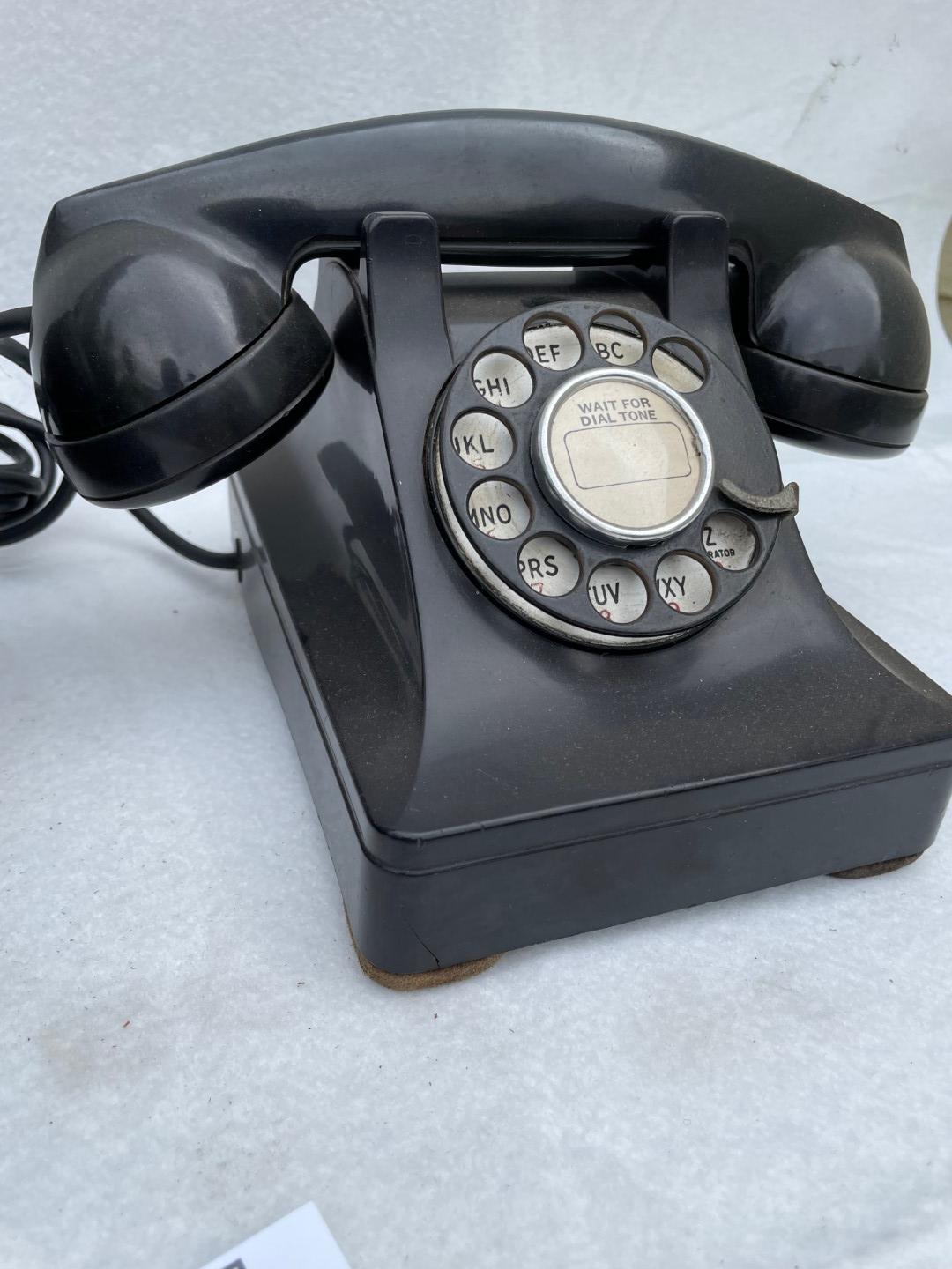 Pair of Western Electric Metal model 302 desk telephone