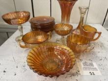 large group of Amber Carnival Glass plates, bowls, stemware, creamers, etc…