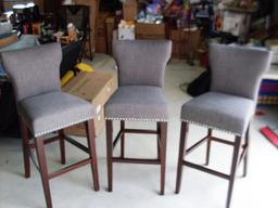 Three 30" tall grey bar stools